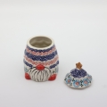 Ceramic container Gnome Christmas tree with lid A523 D3 – hand-painted Bolesławiec pottery in the shape of a gnome and Christmas tree, decorative and practical for storing sweets or small items.