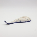 Made of durable stoneware and decorated with traditional Polish folk patterns.